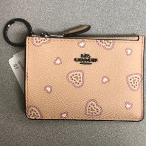 Coach I.D., key and coin mini purse